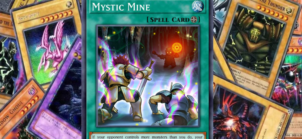 Close-up da carta mágica Mystic Mine sobreposta a outras cartas do jogo Yugioh.